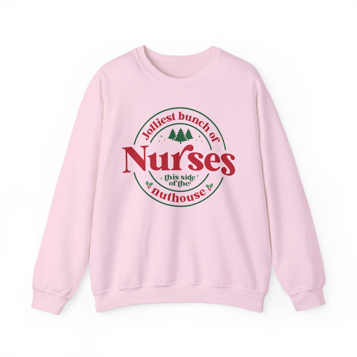 Pink Christmas sweatshirt with the humorous phrase 'Jolliest bunch of Nurses this side of the nuthouse,' surrounded by festive elements like trees and holly. A perfect holiday-themed gift for nurses with a sense of humor, celebrating Christmas in a fun and lighthearted style.